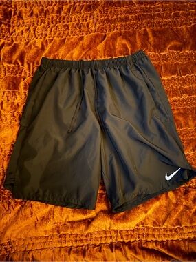Nike Men's Black Athletic Shorts with White Swoosh